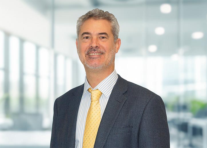 Brodie McHutchison, project & infrastructure advisory, smiling at the camera.