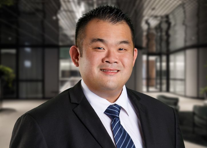 Eng Hua Ng smiles at the camera