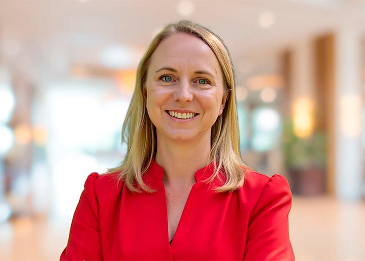 Photo of Elysia Rothwell smiling at the camera