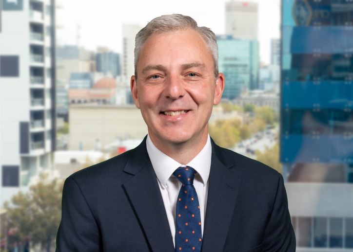 Tim Sandow smiles at the camera