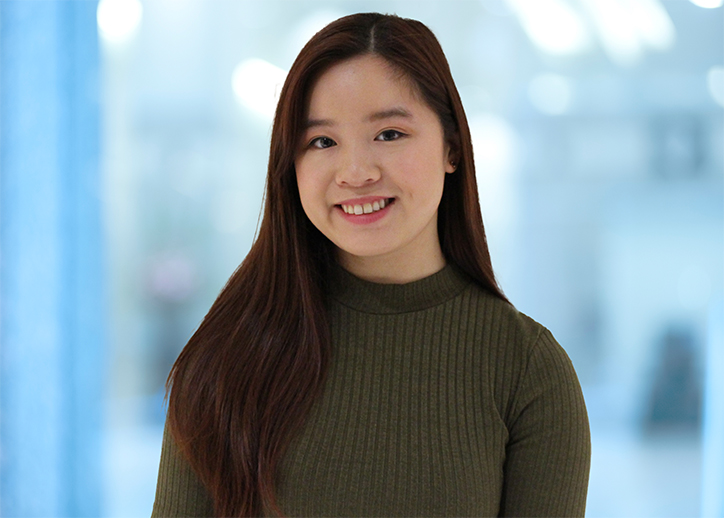 Jacquie Tran smiles at the camera